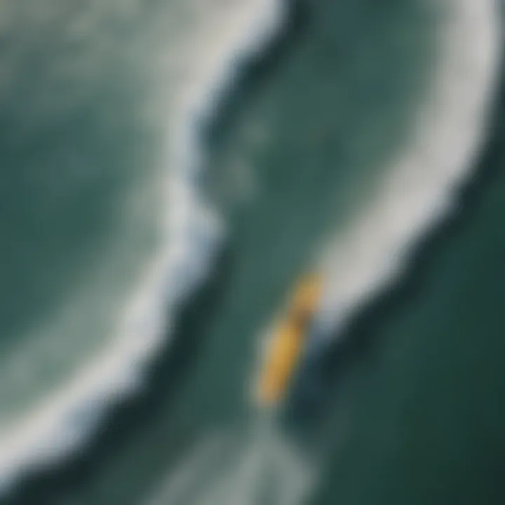 Aerial view of surfers navigating the waves with GPS technology