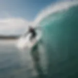 Surfer riding a perfect wave at Alaia Bay