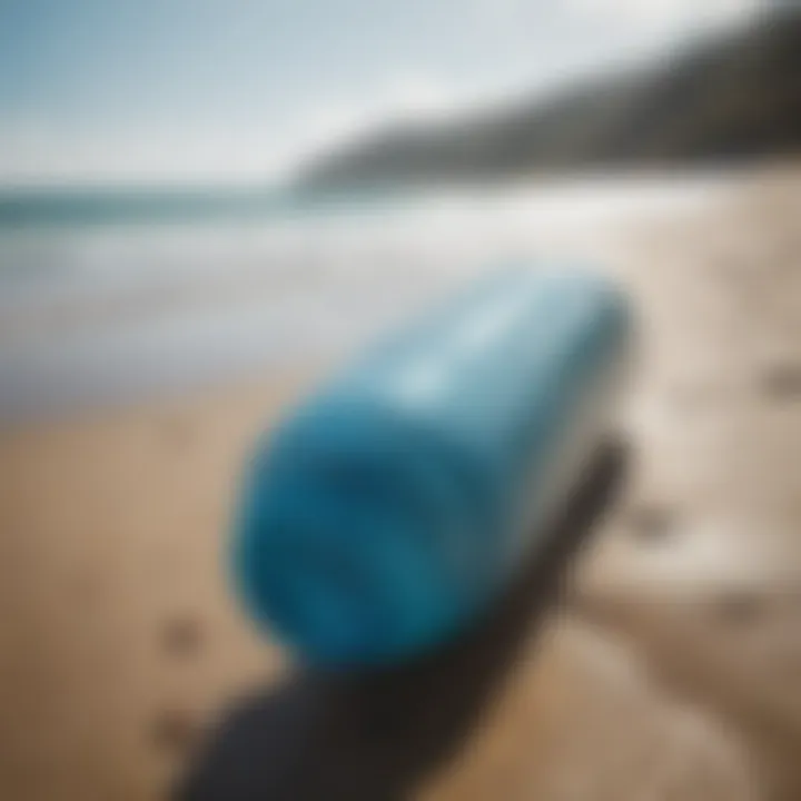 Close-up of a water bottle on the beach