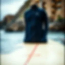 High-quality neoprene wetsuit displayed on a surfboard