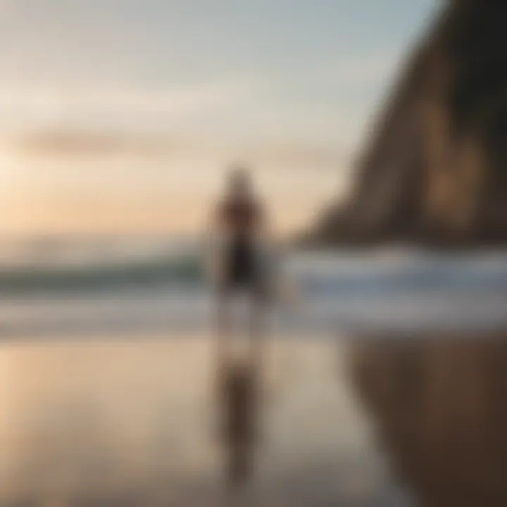 Surfer practicing yoga on the beach