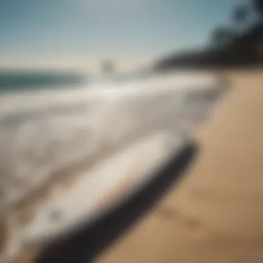 Cabrinha Double Agent surfboard on a beach backdrop