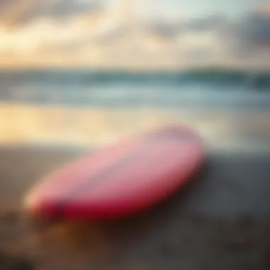 A vibrant foamie surfboard on the beach