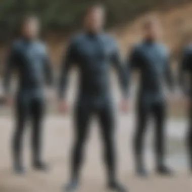 Various thickness options of winter wetsuits displayed side by side
