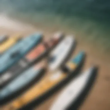 An assortment of stand-up paddleboards displayed for selection.