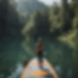 A serene landscape showcasing a calm lake ideal for paddleboarding.