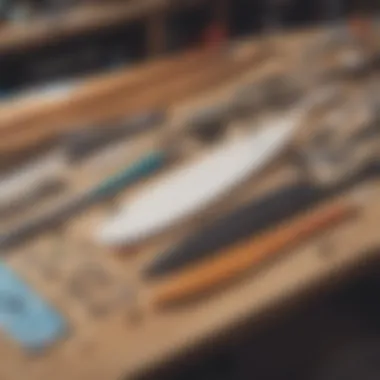 An array of surfboard shaping tools laid out on a workbench