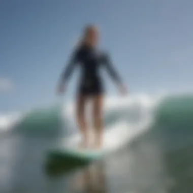 Cynthia Rowley's Connection to Surfing Cynthia Rowley engaging in surfing, symbolizing her connection to the ocean