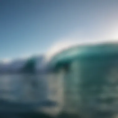 Surfboard on a wave with clear blue sky