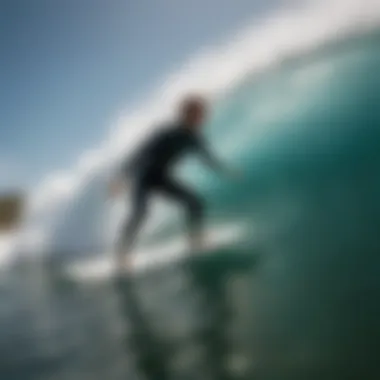 A surfer riding a wave on a Deus Ex Machina surfboard, capturing the essence of surfing culture.