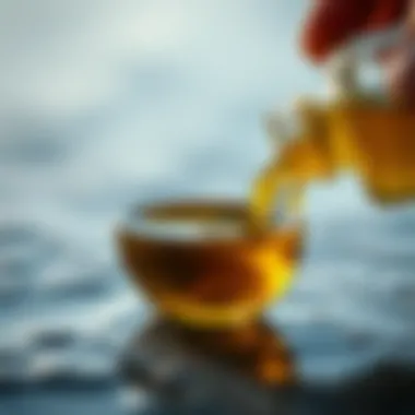 Natural Solutions for Wax Removal Natural oil being poured into a small bowl