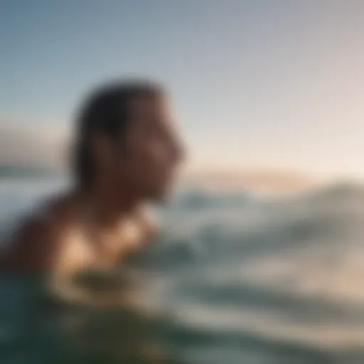 A surfer taking a deep breath before paddling out