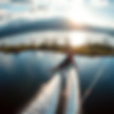 An aerial view of foil wakeboarding over a lake