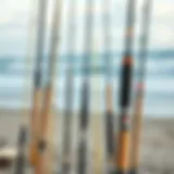 Showcasing various surf fishing rods on a sandy beach