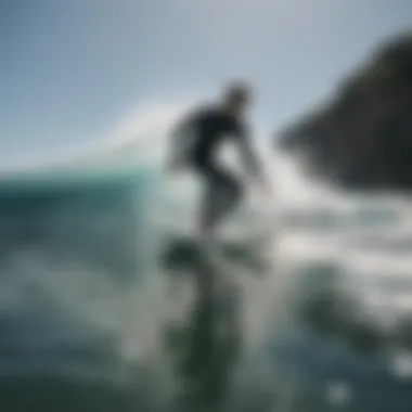 Surfer demonstrating the use of fin tethers in action