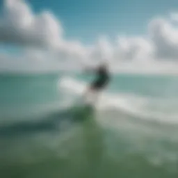 Kiteboarder gliding over turquoise waters