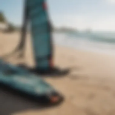 Kitesurfing gear lined up on the beach