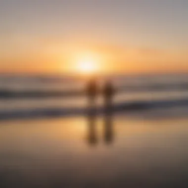 A vibrant sunset over a San Diego beach with surfers in silhouette