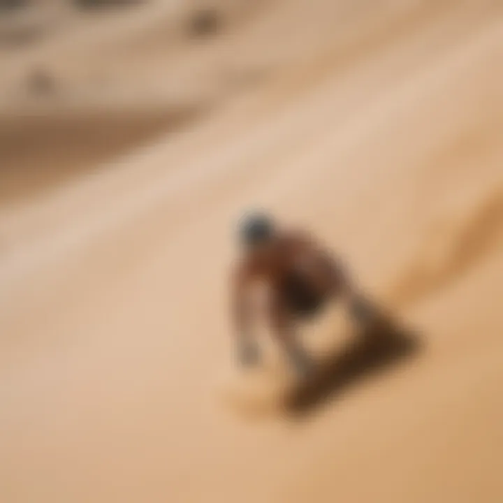 An individual gracefully sandboarding down a steep dune