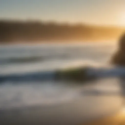 A breathtaking view of Santa Cruz coastline at sunrise with surfers preparing to catch early morning waves.