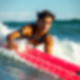 A surfer wearing Sharkbands on a vibrant wave