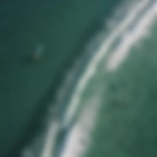 Aerial view of surfers riding waves in Destin