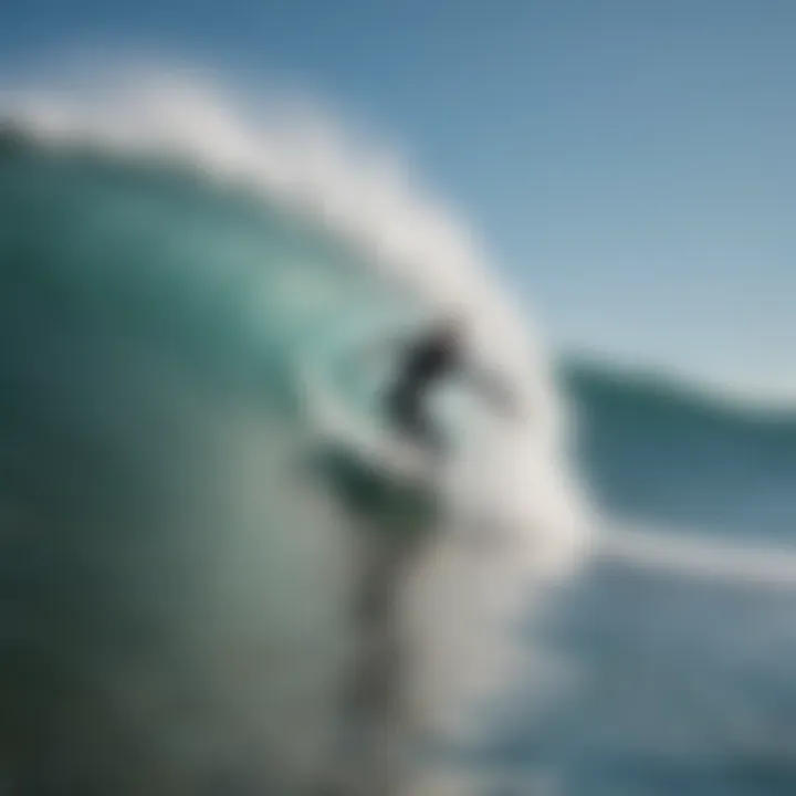 Surfer catching a wave at Monterey beach