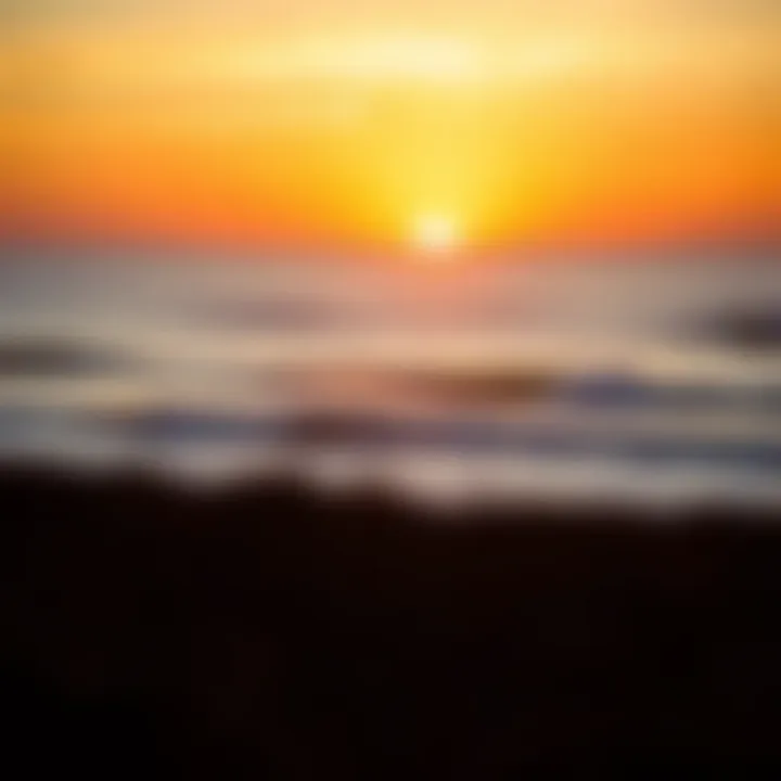 A vibrant sunset over the surf break in Taghazout, illustrating the perfect surfing conditions.