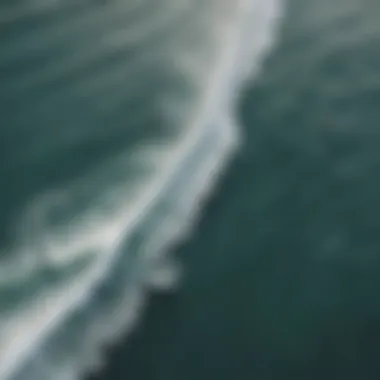 An aerial shot of surfers riding waves at a renowned surf destination