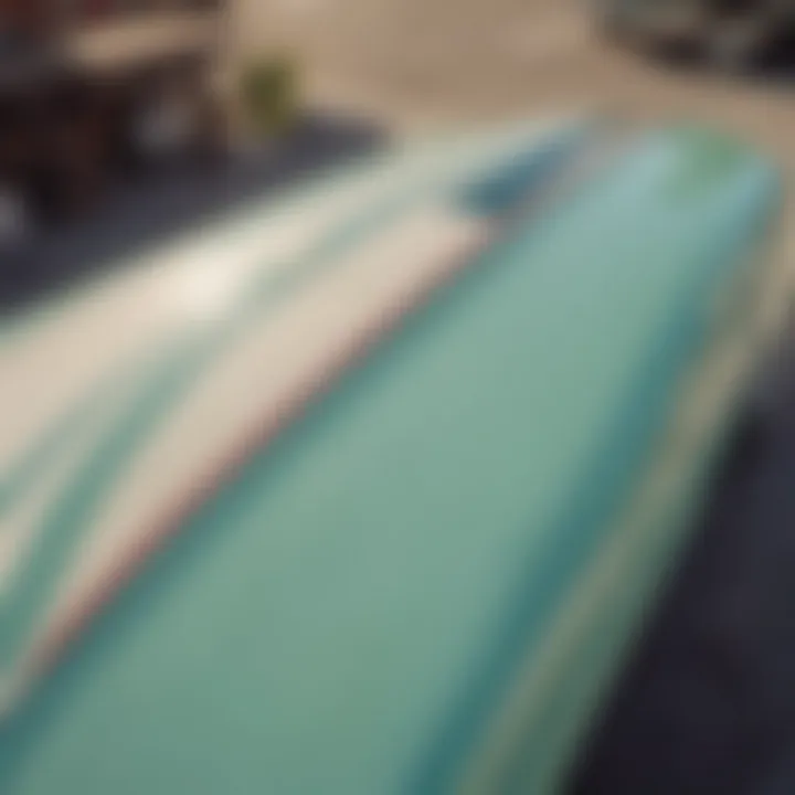 Vintage surfboards loaded on a surf green Mustang roof