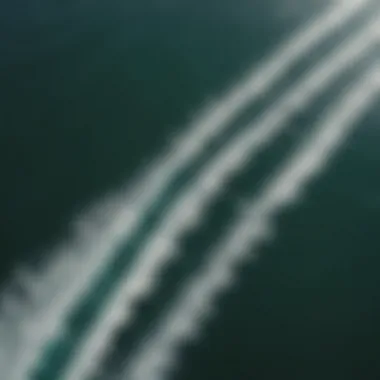 An aerial view of surfers utilizing hydrofoil technology in the ocean