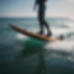 A futuristic battery hydrofoil surfboard gliding over the water