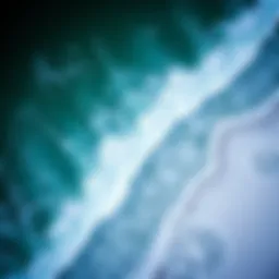 Aerial view of ocean waves with salt deposits on the coastline