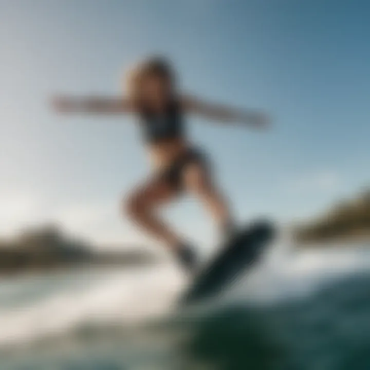 A female wakeboarder performing a jump over a wave