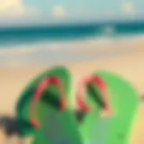 Colorful flip flops on a sandy beach