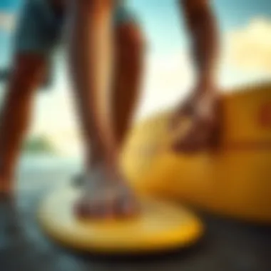 Surfer adjusting flip flops before heading out