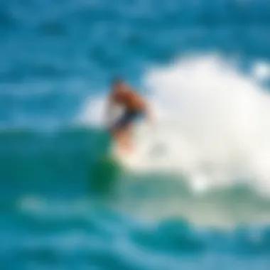 Surfer Riding a Wave on a Soft Top Long Surfboard Surfer riding a wave on a soft top long surfboard