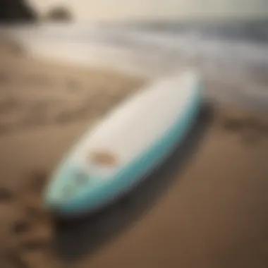 An eco-friendly surfboard made from foam core materials displayed on the beach.