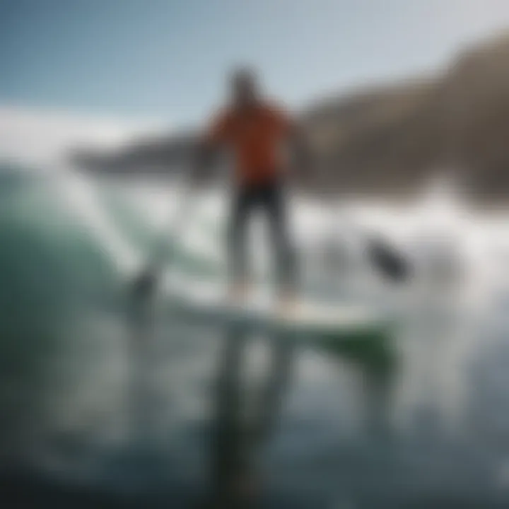 An action shot of a paddle boarder navigating through dynamic water waves.