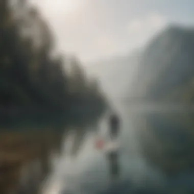 A beautifully serene lake scene with paddle boards lined along the shore.