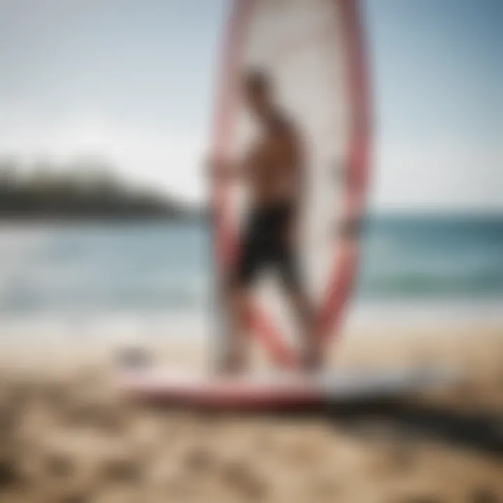 A well-maintained wind surf board being adjusted for a session