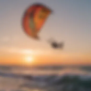 A stunning sunset backdrop with a kitesurfer performing an aerial maneuver