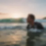 Surfer practicing deep breathing on the beach