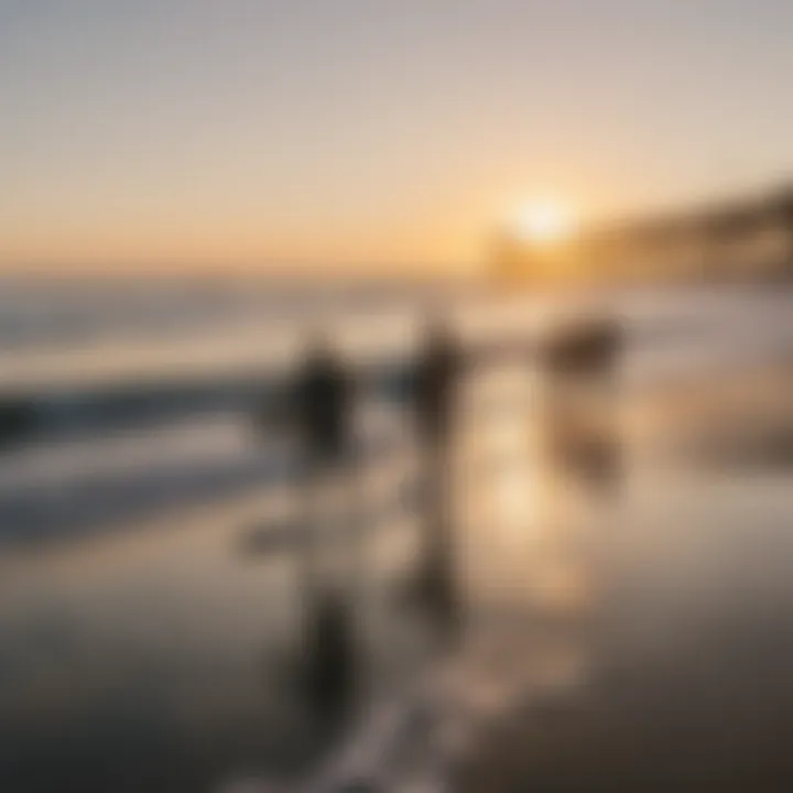 A group of enthusiastic surfers enjoying the sunset at Huntington Beach