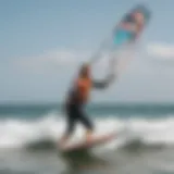 Kite surfing trainer demonstrating techniques on the beach