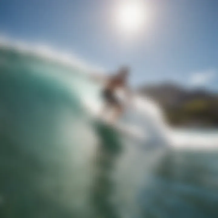 Surfer riding a wave at Waikiki Beach