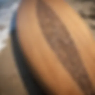 Surfboard with intricate design on the beach