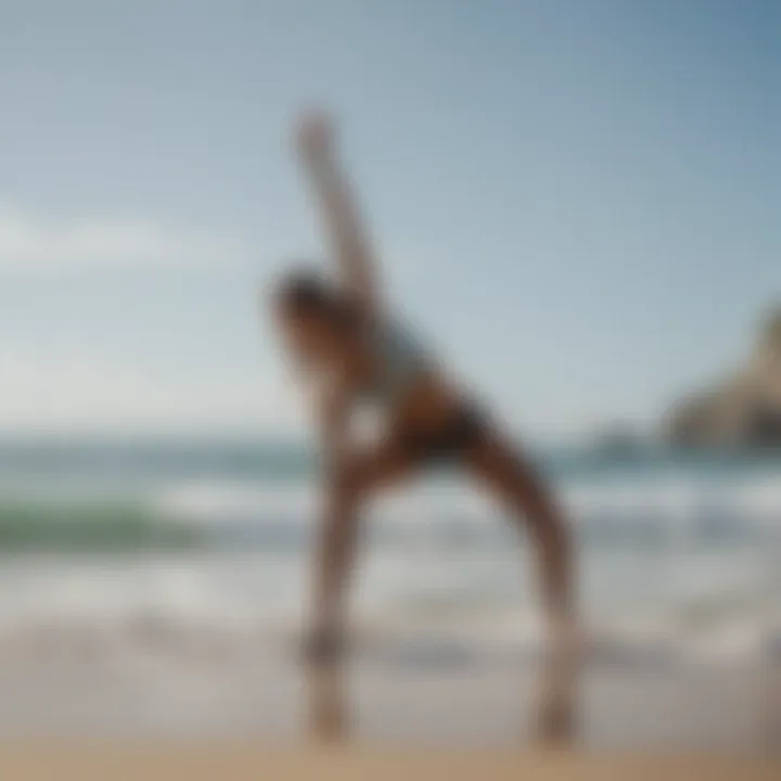 Athlete practicing yoga on the beach