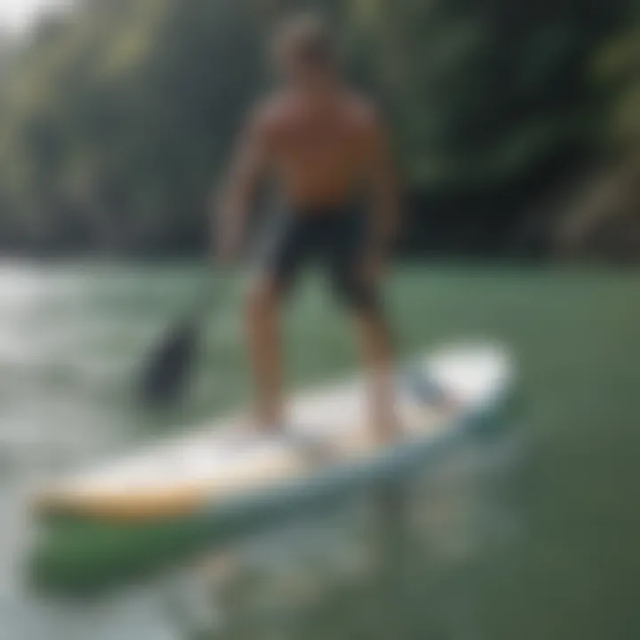 A paddle boarder demonstrating proper stance and posture