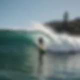 Surfer catching a wave at Tamarack Surf Beach